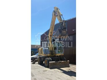 New Holland MH plus, 28.000 €, 2006. , Bager, Dizel, 6000 cm3, 98kW (133 KS), Automatski menjač, Zrenjanin