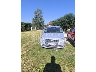 Volkswagen Touran, 3.500 €, 2008. Monovolumen (MiniVan), Dizel | 1896 cm3, 220.000 km, 77kW (105 KS), Automatski / poluautomatski, 4/5 vrata, 5 sedišta, Čačak