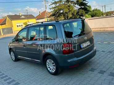 Volkswagen Touran, 1.999 €, 2005. Monovolumen (MiniVan), Dizel | 1896 cm3, 241.357 km, 66kW (90 KS), Manuelni 6 brzina, 4/5 vrata, 5 sedišta, Šabac