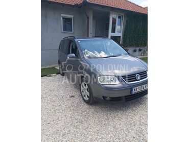 Volkswagen Touran, 3.800 €, 2005. Monovolumen (MiniVan), Dizel | 1896 cm3, 230.000 km, 77kW (105 KS), Manuelni 6 brzina, 4/5 vrata, 5 sedišta, Aranđelovac