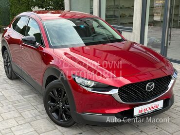 Mazda CX-30 2.0 eSkyactiv Homura (može zamena), 23.000 €, 2023. Džip/SUV, Hibridni pogon (benzin) | 1998 cm3, 51.000 km, 110kW (150 KS), Manuelni 6 brzina, 4/5 vrata, 5 sedišta, Irig