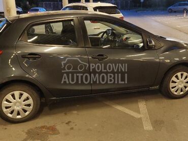 Mazda 2, 2.800 €, 2009. Hečbek, Benzin | 1349 cm3, 242.623 km, 55kW (75 KS), Manuelni 5 brzina, 4/5 vrata, 5 sedišta, Niš