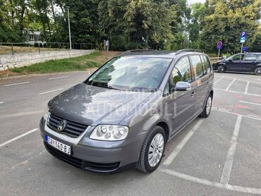 Volkswagen Touran 2.0 TDI, 3.950 €, 2006. Monovolumen (MiniVan), Dizel | 1968 cm3, 305.000 km, 103kW (140 KS), Manuelni 6 brzina, 4/5 vrata, 7 sedišta, Čačak
