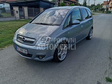 Opel Meriva 1.8i 16v (može zamena), 2.690 €, 2006. Monovolumen (MiniVan), Benzin | 1796 cm3, 243.500 km, 92kW (125 KS), Manuelni 5 brzina, 4/5 vrata, 5 sedišta, Obrenovac