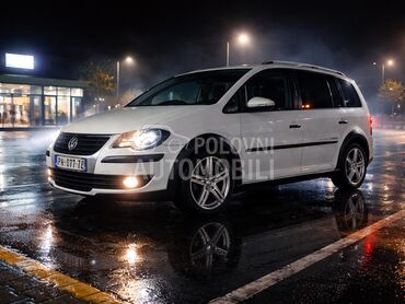 Volkswagen Touran Cross DSG (može zamena), 5.500 €, 2009. Monovolumen (MiniVan), Benzin | 1390 cm3, 230.600 km, 103kW (140 KS), Automatski / poluautomatski, 4/5 vrata, 5 sedišta, Paraćin