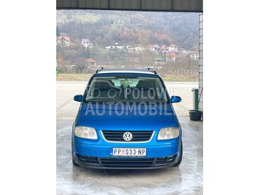 Volkswagen Touran Touran 2.0 TDI (može zamena), 3.200 €, 2005. Monovolumen (MiniVan), Dizel | 1968 cm3, 340.000 km, 103kW (140 KS), Manuelni 6 brzina, 4/5 vrata, 7 sedišta, Prijepolje