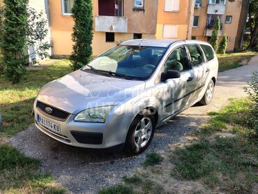 Ford Focus MK2 (može zamena), 1.800 €, 2005. Karavan, Benzin + Metan (CNG) | 1596 cm3, 263.668 km, 74kW (101 KS), Manuelni 5 brzina, 4/5 vrata, 5 sedišta, Pančevo
