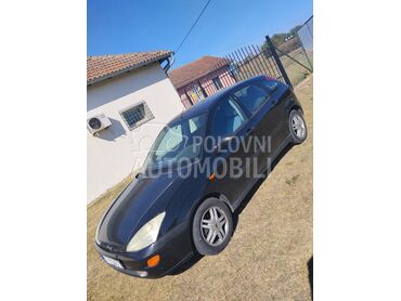 Ford Focus 1.6 (može zamena), 1.300 €, 2005. Hečbek, Benzin | 1596 cm3, 210.520 km, 74kW (101 KS), Manuelni 5 brzina, 4/5 vrata, 5 sedišta, Zemun